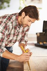 Image showing Man, carpenter and desk with wood, thinking and building for renovation, repair and maintenance. Craftsman, handyman and contractor with diy, craft and artisan for woodwork, home improvement or work