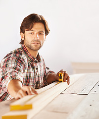 Image showing Craftsman, maintenance and working in building, professional and technique for woodwork, career. Man, crafting and materials from nature, builder and indoor for diy, home improvement and handiwork