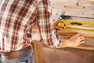 Image showing Man, crafting and professional with work, garage and indoor for maintenance, contractor and skill. Handyman, job and career as artisan, craftsmanship and working for store, furniture and natural