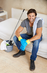 Image showing Man, house and cleaning with living room, break and portrait with happy, rest and smile. Husband, home and furniture for maintenance, housekeeping and spring cleaning for responsibility or routine