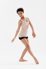 Image showing Dance, ballet and woman on a white background for performance, fitness and training for theatre. Ballerina, dancer and isolated person pose for balance, creative routine and practice in studio