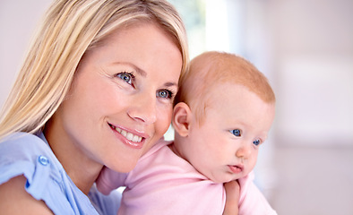 Image showing Mother, child and smiling for love and embrace, bonding and security in connection at home. Mommy, daughter and happy while hugging on weekend, caring and family or affection, satisfaction for joy