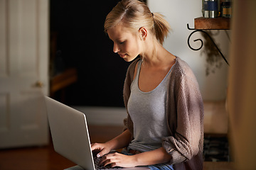Image showing Woman, freelancer and laptop for networking, remote work and internet connection in kitchen for info. Female person, editor and website for research or online news, blog and typing an article on tech