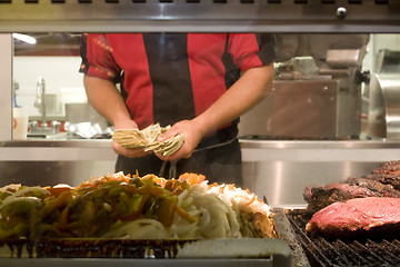 Image showing Business Owner Counting Money