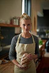 Image showing Bakery, kitchen and portrait of woman with bread, cooking gluten free food and healthy breakfast. Fresh, loaf and chef in restaurant with rye or sourdough after preparation process of brunch or lunch