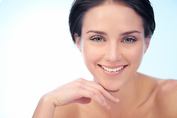 Image showing Skincare, smile or portrait of happy woman in studio isolated on blue background for wellness or anti aging. Smooth, spa or natural dermatology results of confident person with beauty, face or glow