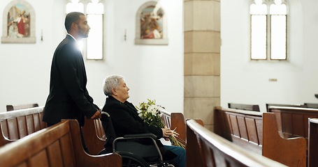 Image showing Sad, funeral and church with old woman and wheelchair user for death, mourning and widow. Depression, grief and help with person with a disability at chapel for bereavement, burial ceremony and loss