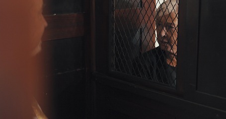 Image showing Priest, talking and listening in confession booth with senior woman, sinner or secret for forgiveness in church. Holy father, elderly lady and speaking for mental health, sorry or connection with God