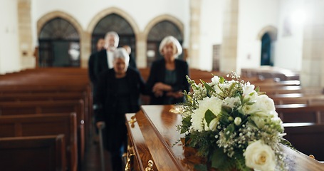 Image showing Funeral, church and people with coffin for goodbye, mourning and grief in memorial service. Depression, family and sad senior women with casket in chapel for greeting, loss and burial for death