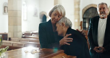 Image showing Senior women, coffin and funeral in church for memory, support and condolences with religion with family. Community, friends and together for death, loss and service with empathy, faith and casket