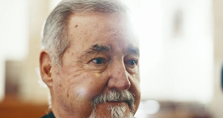 Image showing Sad, senior man and face closeup at a funeral in church for religious service and mourning. Grief, male person and burial with death, ceremony and grieving of chapel event of family member or friend