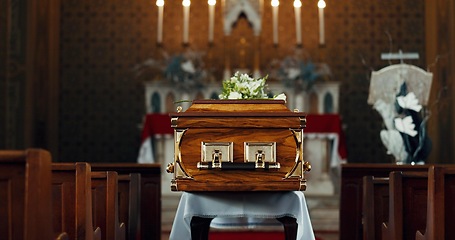 Image showing Coffin, church and funeral service in closeup, memorial and event to celebrate life, worship and faith. Casket, burial and memory with death, mourning and compassion for farewell, sermon and religion