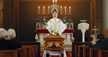 Image showing Funeral, church and pastor with prayer by coffin for memorial service, sermon and ceremony for death. Religion, guidance and male priest praying with congregation for comfort with casket in chapel