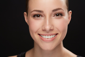 Image showing Model, happiness and portrait in studio with cosmetics, closeup and beauty results of cosmetology in mockup. Woman, face and skincare with retinol for glow, facial and make up on black background