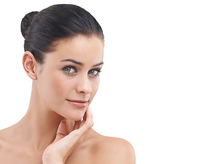 Image showing Woman, portrait and skincare with beauty, makeup or cosmetics on a white studio background. Face of female person, brunette or model with smile in satisfaction for facial treatment on mockup space
