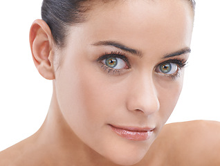 Image showing Woman, portrait and eyes with beauty, makeup or cosmetics on a white studio background. Face of young female person, brunette or model in satisfaction for mascara, cosmetology or facial treatment