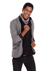 Image showing Man, portrait and celebration in studio for win, fist pump and cheering on white background. Male person, happy and excited for promotion or discount, information and announcement or lottery success