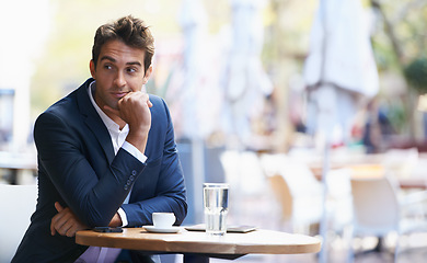 Image showing Thinking, business and man outdoor at cafe with idea for future or entrepreneur waiting at table with espresso. Professional, customer or person planning schedule at coffee shop with drink in morning