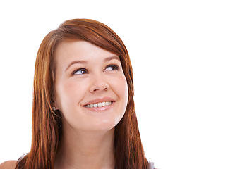 Image showing Woman, face and thinking or smile in studio for problem solving, contemplating and wondering on mockup space. Person, thoughtful or daydreaming with redhead, solution and happy on white background