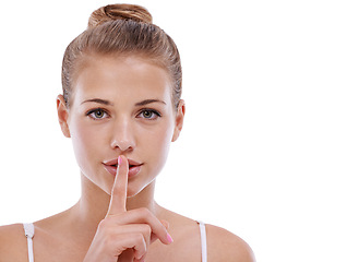 Image showing Woman, portrait and shush for privacy in studio, quiet and confidential information or news. Female person, mute and silent emoji for gossip or drama, secret and whisper icon on white background