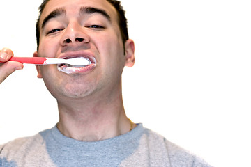 Image showing Man Brushing His Teeth