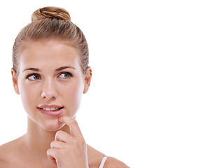 Image showing Woman, face and thinking or decision in studio for problem solving, contemplating or wondering on mockup space. Person, thoughtful or daydreaming with confidence, solution or hand on white background