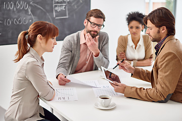 Image showing Meeting, collaboration and business people with tablet in office for planning or strategy together. Teamwork, research on technology with man and woman employee group talking in workplace boardroom