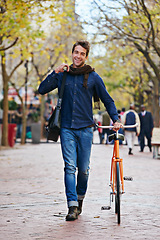 Image showing Happy man, portrait and push bicycle in city to travel on eco friendly transport outdoor, commute and trip. Cycling, person and bike in urban town, street and road for journey at sidewalk of park