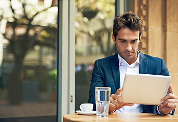 Image showing Businessman, tablet and coffee at cafe or reading for online research or communication, internet or social media. Male person, espresso and city restaurant in Italy for work trip, networking or email