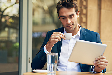 Image showing Businessman, tablet and coffee at cafe for online research or communication, internet or social media. Male person, espresso and reading at city restaurant in Italy for work trip, networking or email