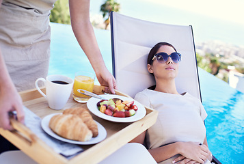 Image showing Hotel, pool and woman with luxury brunch for business trip, waitress and relax with rooftop service. Travel, hospitality and businesswoman on lounge chair for breakfast, sunshine and villa holiday