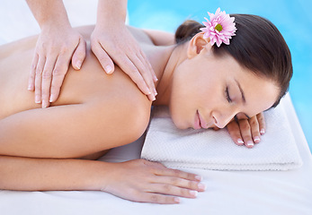 Image showing Relax, massage and woman at spa pool with flower for health, wellness and luxury holistic treatment. Self care, peace and girl on table with masseuse for body therapy, sleep and calm hotel service