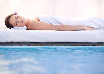 Image showing Relax, sleep and woman at spa pool with massage for health, wellness balance and luxury holistic treatment. Self care, peace and girl on poolside bed for body therapy, comfort and calm hotel service