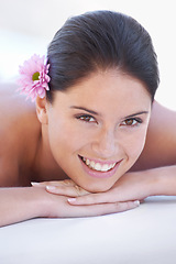 Image showing Portrait, smile and woman at spa to relax closeup for luxury wellness or treatment in hotel or resort. Face, massage or hospitality with happy young customer at beauty clinic for rest and recovery