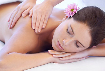 Image showing Luxury, massage and woman at spa for health, wellness and relax with calm holistic treatment. Self care, peace and girl on table with masseuse for body therapy, balance and hotel service hospitality.