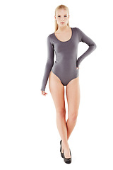 Image showing Fashion, portrait and woman in leotard on studio, white background and mockup in swimwear. Confidence, pride and person in bodysuit for lingerie, underwear or swimsuit with high heels and style