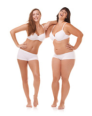 Image showing Portrait, body and underwear with woman friends in studio isolated on white background for natural wellness. Smile, funny or laughing with happy plus size models looking proud of weight loss