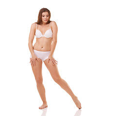 Image showing Body, underwear and woman with fitness, beauty and model isolated on a white studio background. Lingerie, curvy and girl with confidence and mockup space with health and wellness with