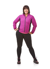 Image showing Portrait, fitness and fashion with plus size woman in studio isolated on white background for workout or style. Smile, exercise or health with happy young model in body positive training outfit