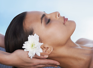 Image showing Sleeping, head massage or hands with woman or flower in spa for wellness, treatment or hospitality. Peace, relax or client with masseuse in hotel on holiday vacation for beauty therapy in a resort