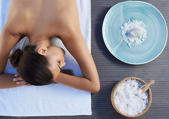 Image showing Sleeping, salt or woman in spa or resort with bowl for wellness, treatment or hospitality. Relax, top or healing therapy for happy person, client or masseuse in hotel on break or holiday vacation