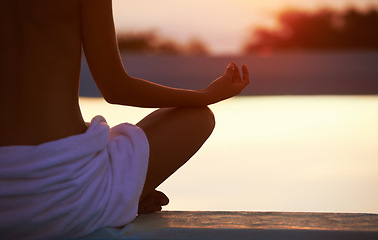 Image showing Back, yoga and hands meditate at sunset by swimming pool for healthy body, wellness and zen outdoor on mockup space. Rear view, lotus pose and person by water at twilight to relax, peace and calm