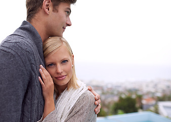 Image showing Man, woman and embrace with portrait by skyline, city or mockup space for care, bonding and love. Couple, people and hug with connection in suburban neighborhood with view of buildings in Los Angeles