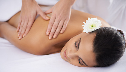 Image showing Woman, back massage and beauty treatment at spa, wellness and muscle therapy for body care. Female person, masseuse and health by dermatology, calm and resting at resort hotel and peace or zen