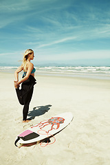 Image showing Beach, stretching and woman on blue sky with surfboard with sports, fitness or exercise in summer. Nature, water and sand with young surfer person on tropical shore for warm up or preparation