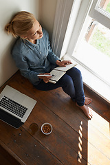 Image showing Woman thinking, floor or writing notes for remote work or internet connection with laptop, drink or ideas. Freelancer, home or writer with notebook for research or working on article in diary journal