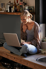 Image showing Laptop, remote work and happy woman in a house for research, planning or web communication. Freelance, smile and female person with startup business idea, search or social media check for inspiration