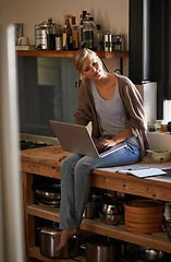 Image showing Woman in kitchen, laptop and remote work, think of ideas for food blog, freelancer and copywriting. Working from home, website and writing article with tech and copywriter search for inspiration