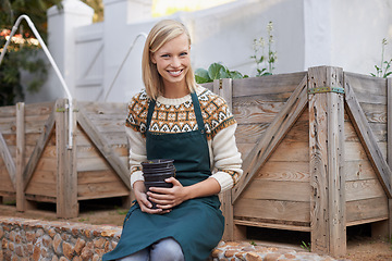 Image showing Smile, woman and vegetable garden with portrait in backyard with agriculture, sustainability and pot. Green, eco friendly and outdoor with healthy growth and a gardener with plant nursery soil