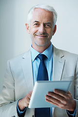 Image showing Portrait, man and CEO with tablet in corporate for networking, communication or task management with confident smile. Male person, boss and technology for planning, agenda or research in office